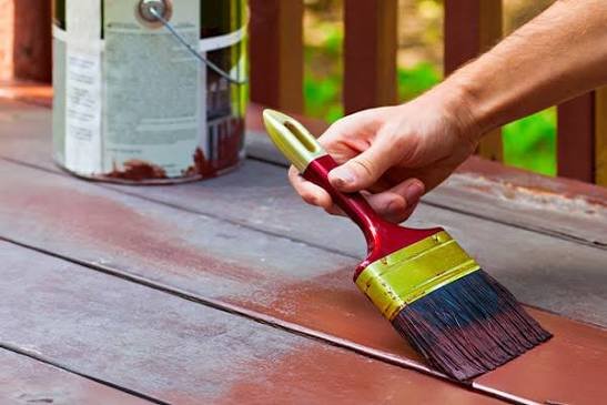 Freshly painted backyard deck with smooth coverage and a clean finished surface
